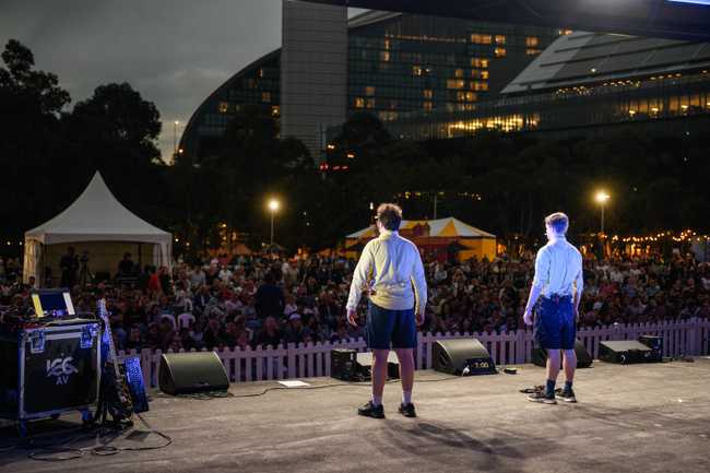Our laptop on stage left connected to a 5G modem that was working hard in a city centre outdoor park with about 3000 people in it