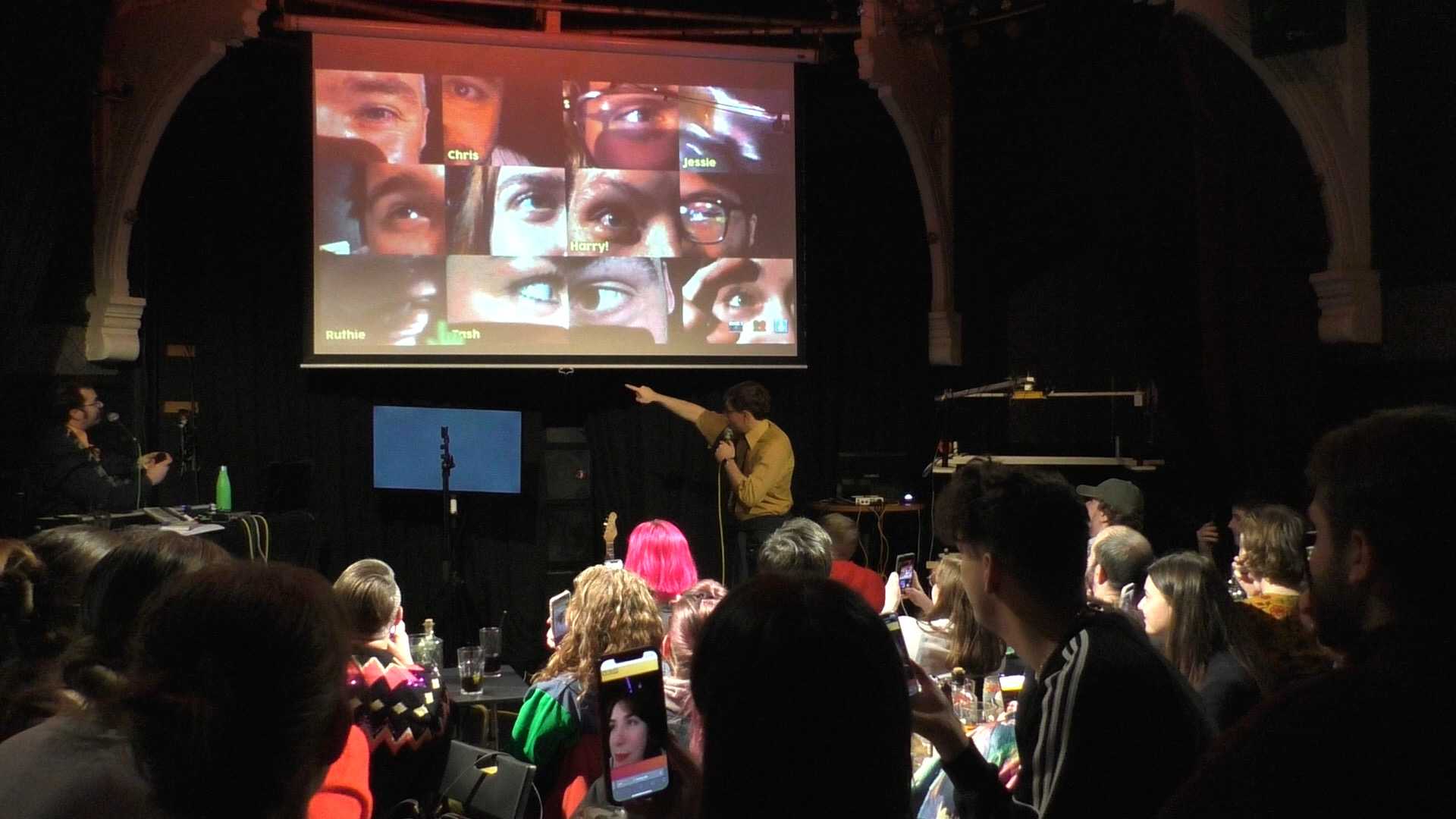 Audience phone cameras shown in a grid on a projector